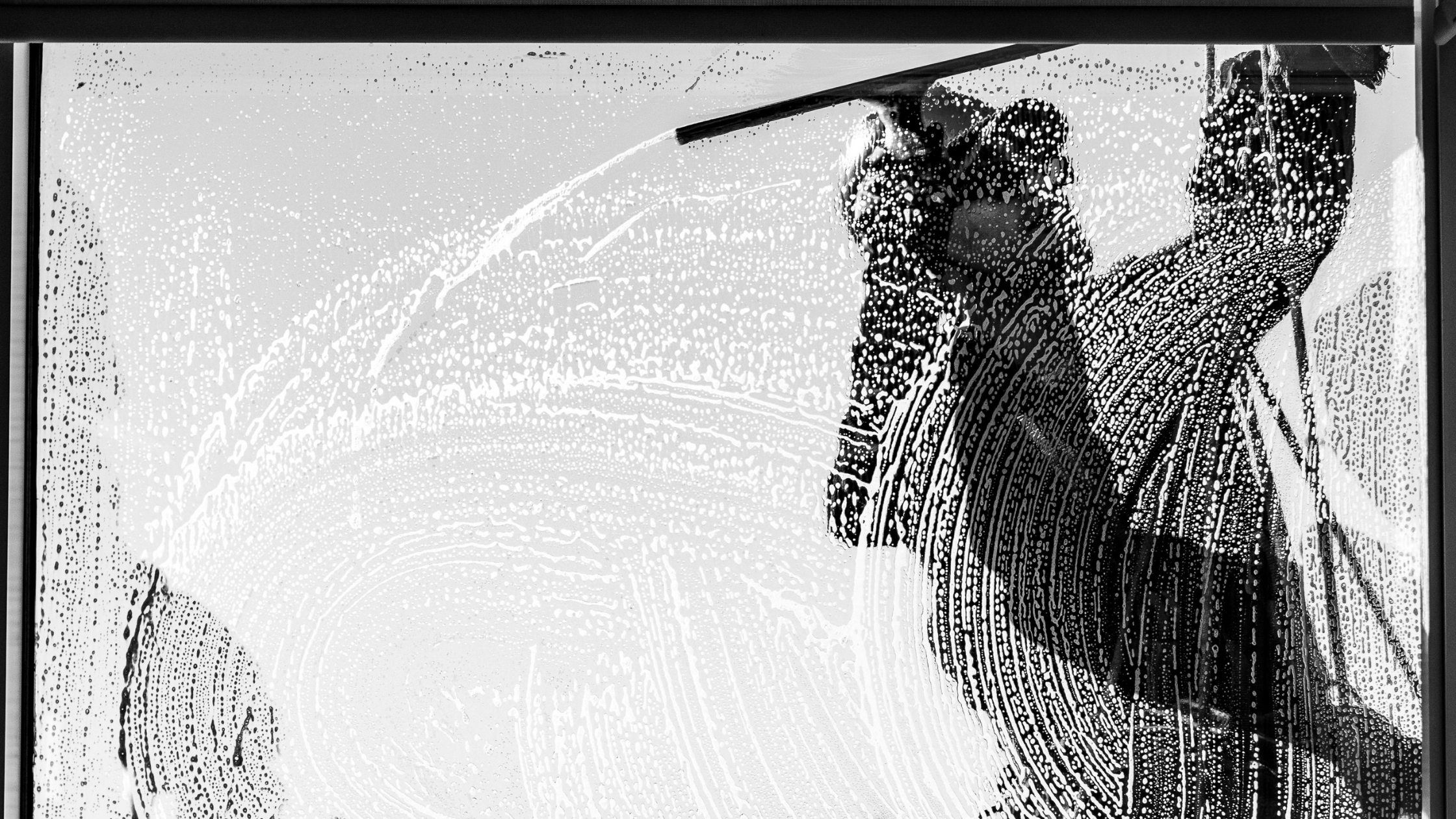 window cleaner outside a window
